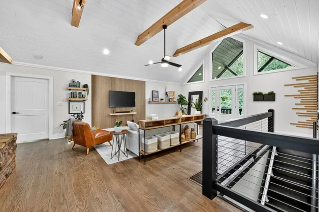 a kitchen with a refrigerator sink and cabinets