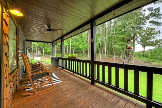 a kitchen with stainless steel appliances granite countertop wooden cabinets a stove top oven a sink and dishwasher