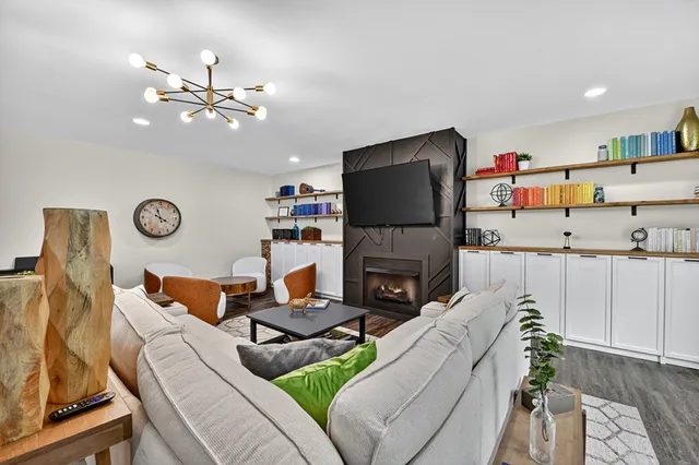 a view of a yard with a tree in the background