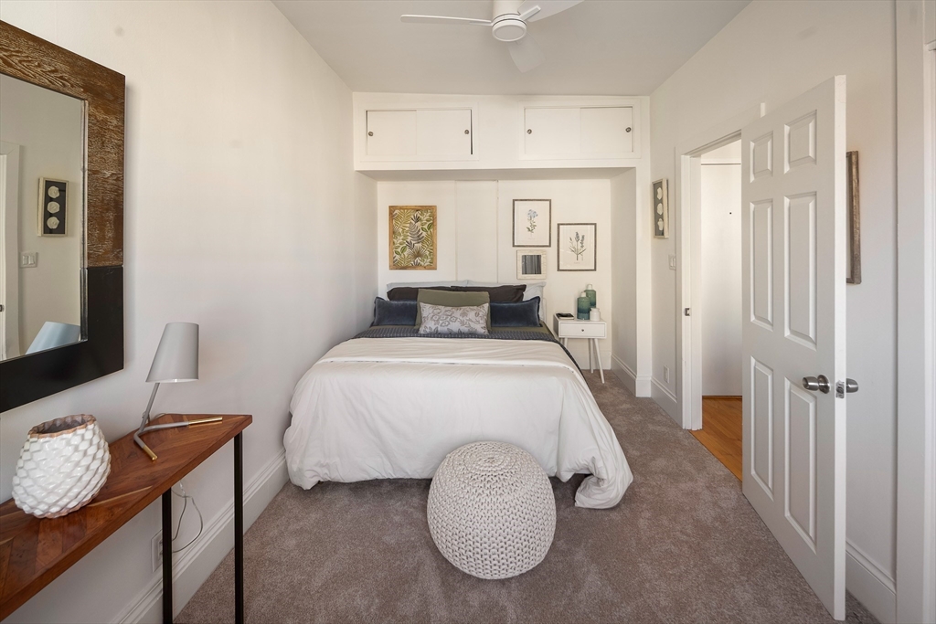 413 Beacon Street, Unit 5 Boston, MA 02115 - Photo 9 of 19 a bedroom with a bed and a window