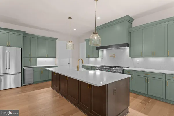 a kitchen with a sink and a window