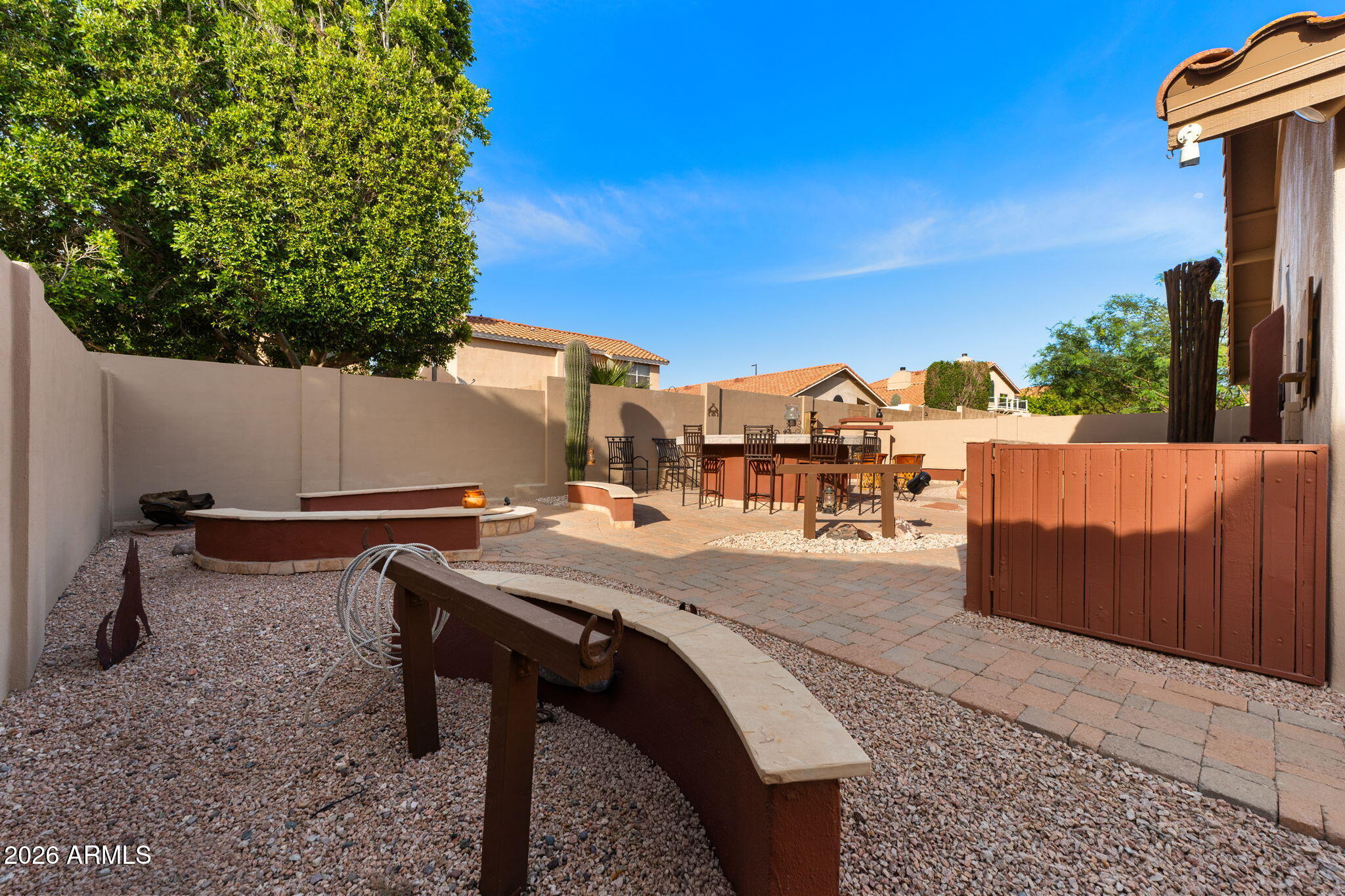 6526 East Raftriver Street Mesa, AZ 85215 - Photo 16 of 17 a view of a terrace with sitting area
