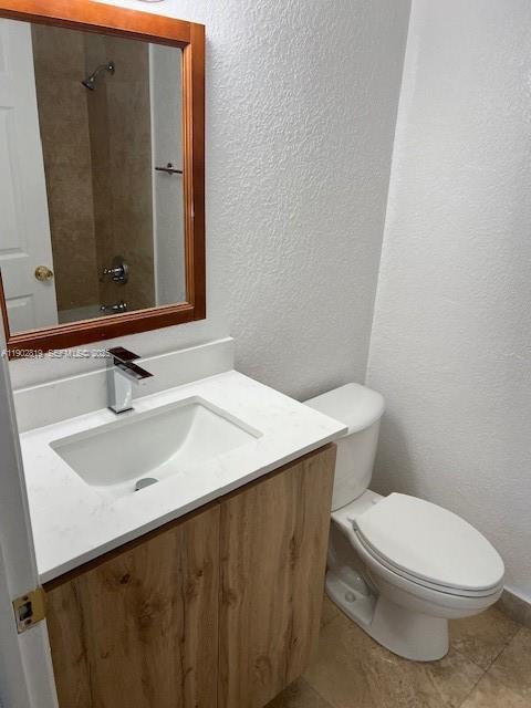 15550 Southwest 80th Street, Unit E101 Miami, FL 33193 - Photo 8 of 21 a bathroom with a sink and a mirror