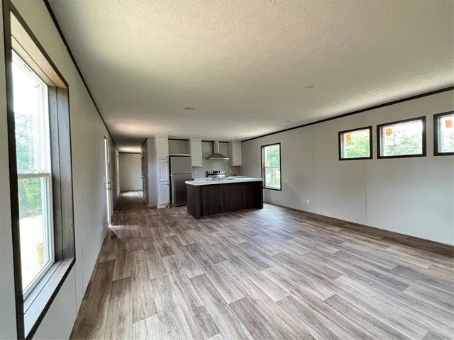 a view of a balcony with chairs