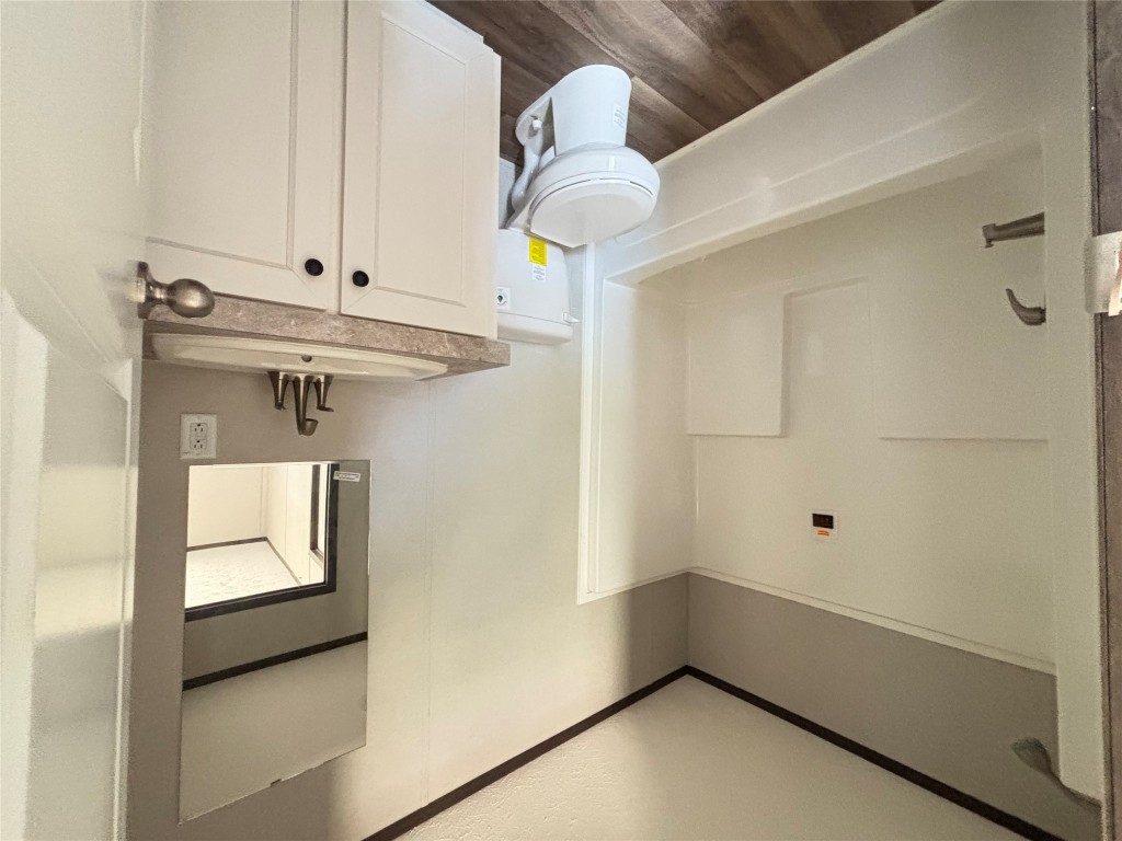 277 Elm Forest Loop, Unit B Cedar Creek, TX 78612 - Photo 17 of 26 a bathroom with a sink toilet and shower