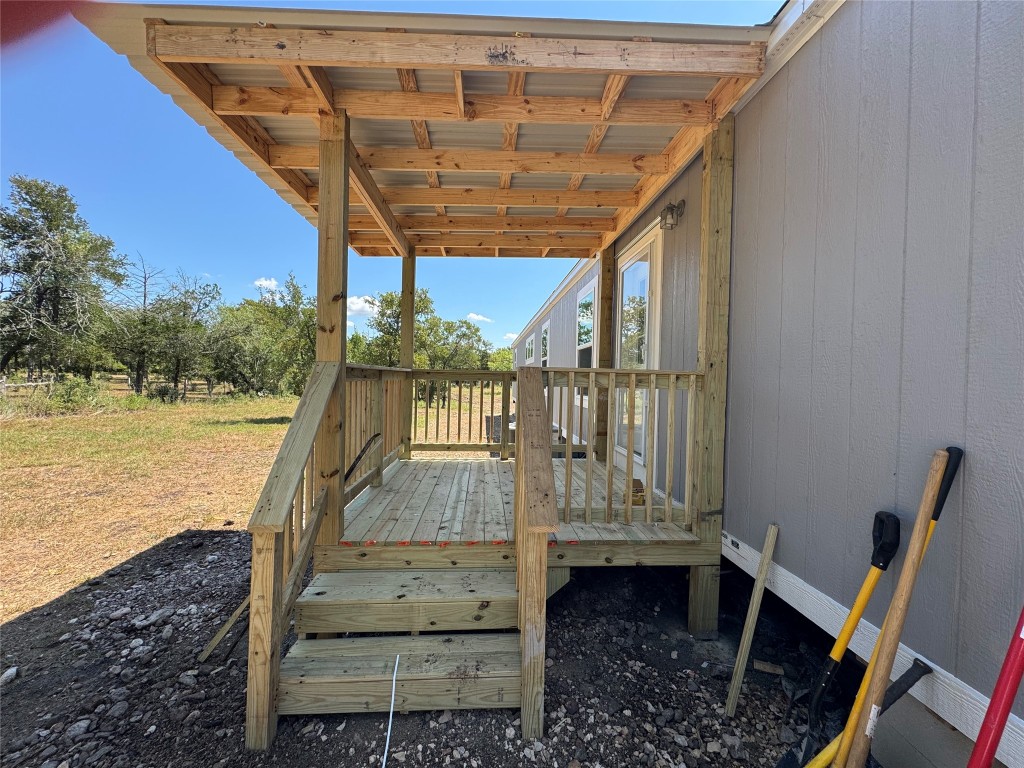 277 Elm Forest Loop, Unit B Cedar Creek, TX 78612 - Photo 24 of 26 a view of a balcony with chairs