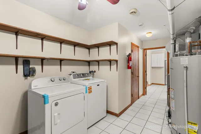 a view of a storage & utility room with a sink