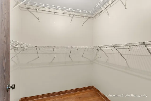 a view of a room with racks on the wall