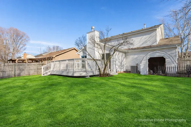 a view of backyard with a garden and entertaining space