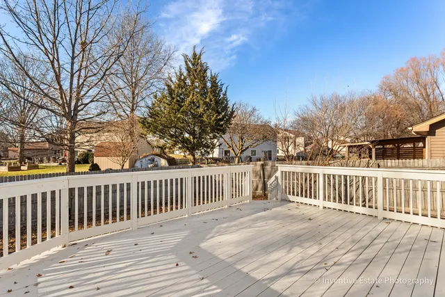 a view of a wooden roof deck
