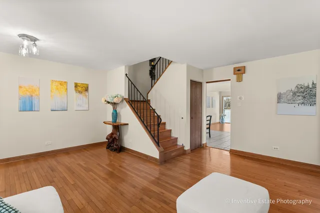 a view of entryway with wooden floor