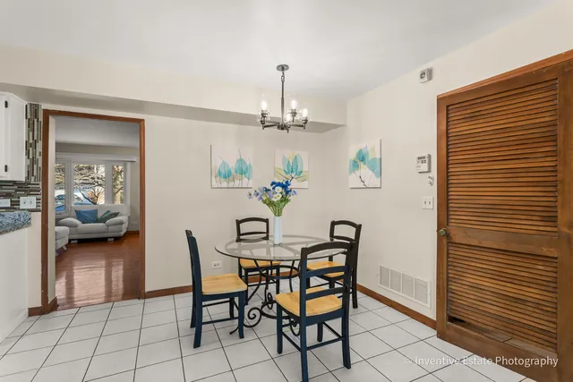 a view of a dining room with furniture