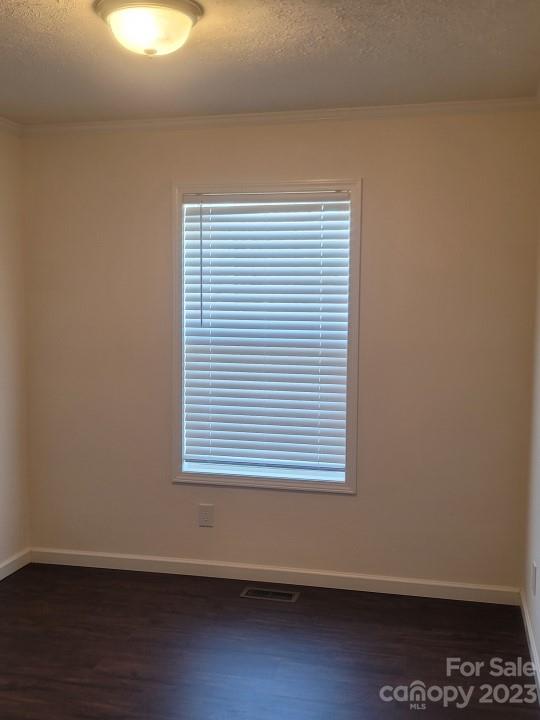 33 Hampton Heights Road Canton, NC 28716 - Photo 6 of 10 a view of a small space with wooden floor and a window