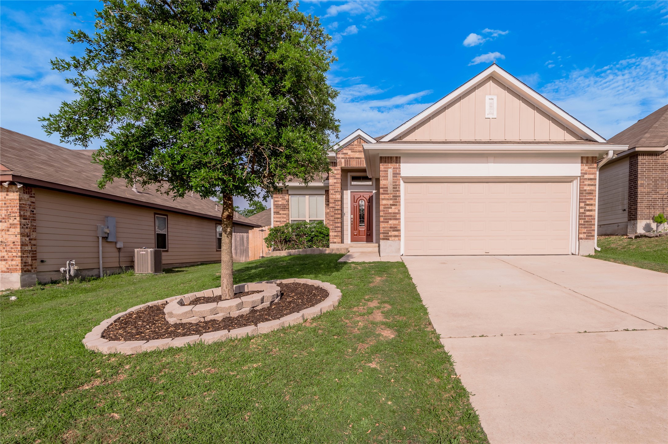 133 Bates Court Huntsville, TX 77320 - Photo 1 of 31 a front view of a house with a yard