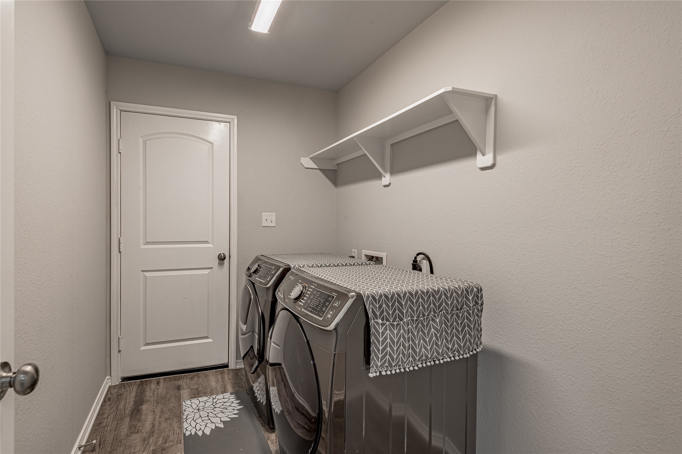 133 Bates Court Huntsville, TX 77320 - Photo 15 of 31 a utility room with dryer and washer