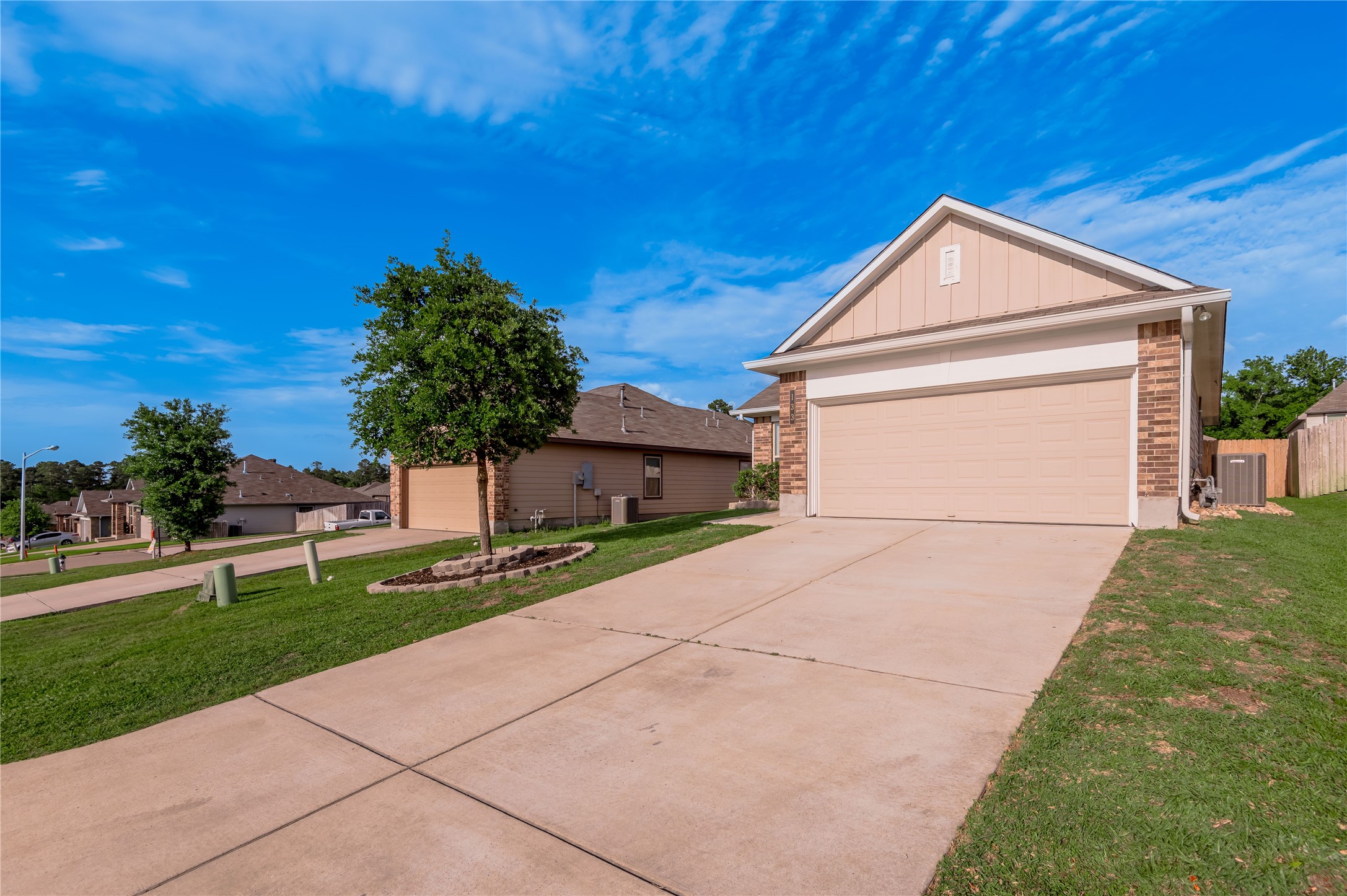 133 Bates Court Huntsville, TX 77320 - Photo 2 of 31 a view of backyard of house with green space