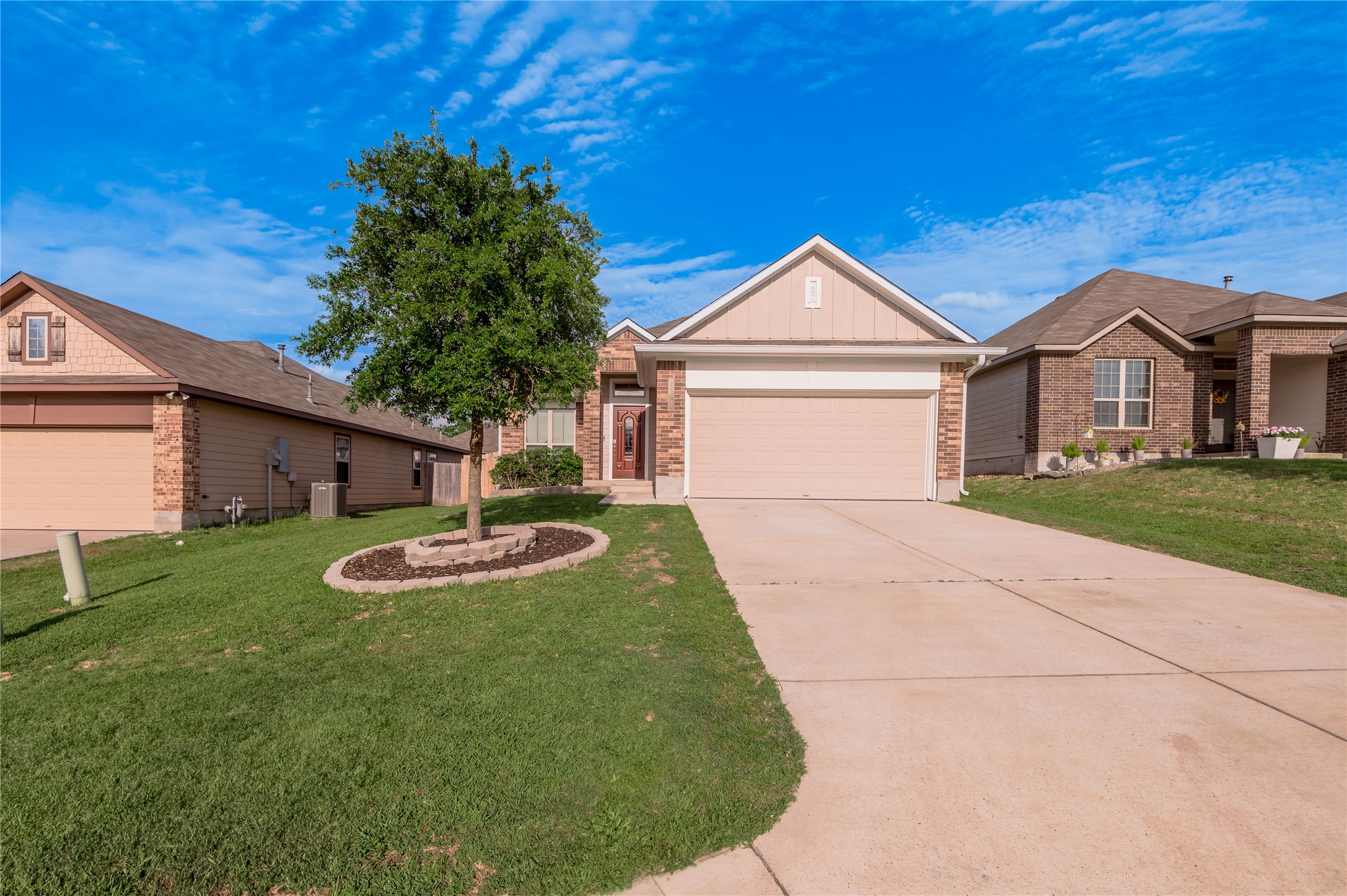 133 Bates Court Huntsville, TX 77320 - Photo 26 of 31 a front view of a house with a yard and garage