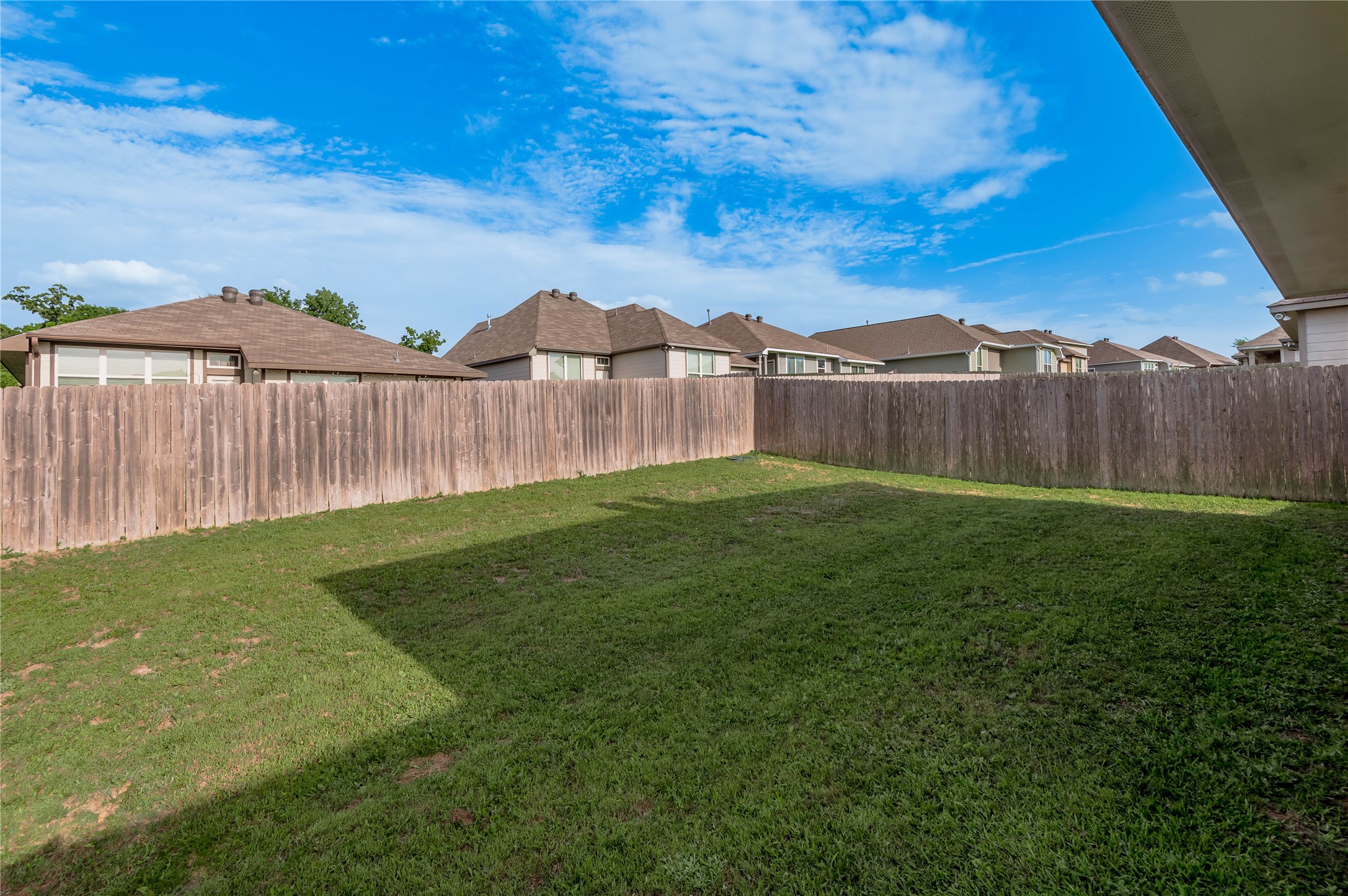 133 Bates Court Huntsville, TX 77320 - Photo 29 of 31 a view of a yard with a large tree