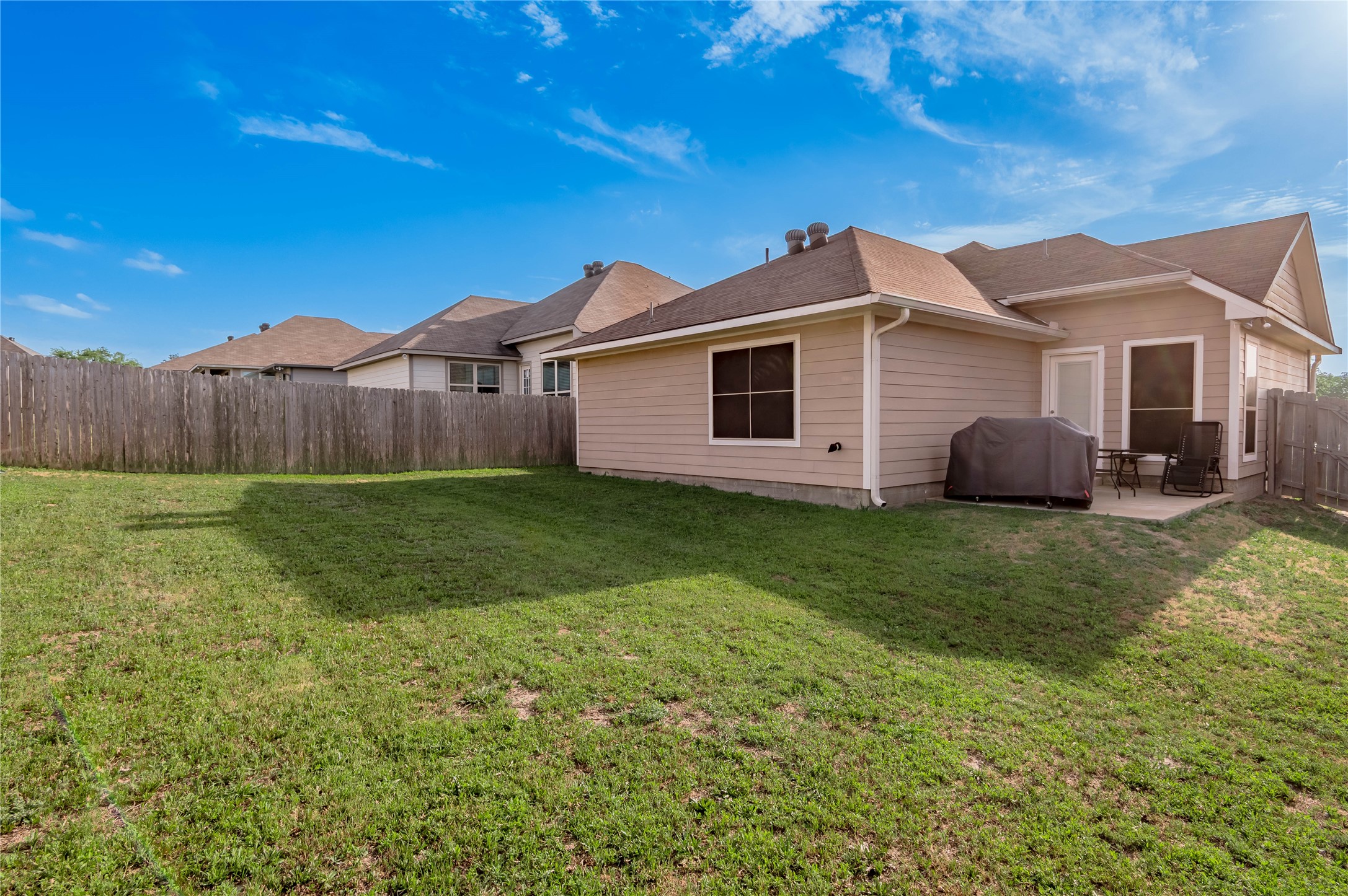 133 Bates Court Huntsville, TX 77320 - Photo 30 of 31 a front view of a house with a garden