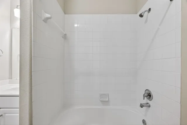 a bathroom with a bathtub