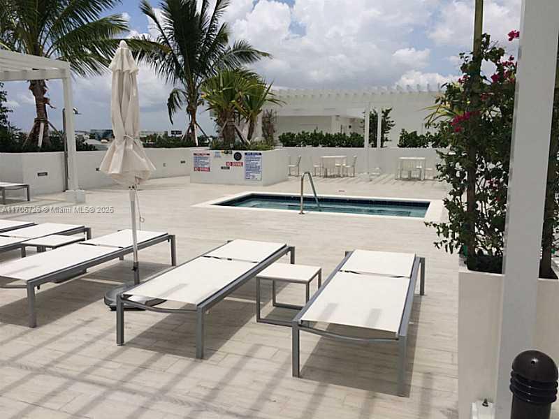 4250 Biscayne Boulevard, Unit 1104 Miami, FL 33137 - Photo 17 of 31 a view of outdoor space with seating