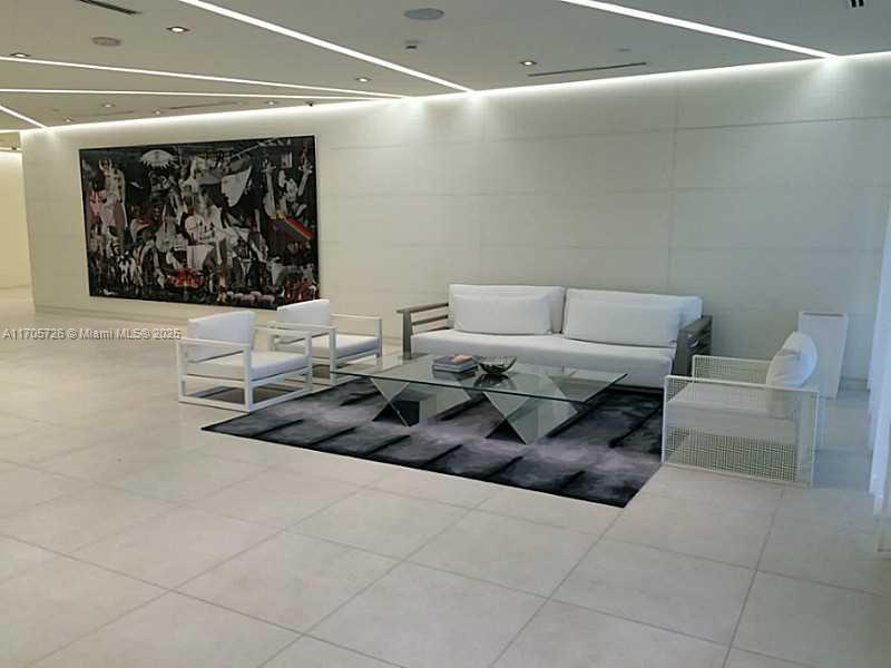 4250 Biscayne Boulevard, Unit 1104 Miami, FL 33137 - Photo 27 of 31 a living room with furniture