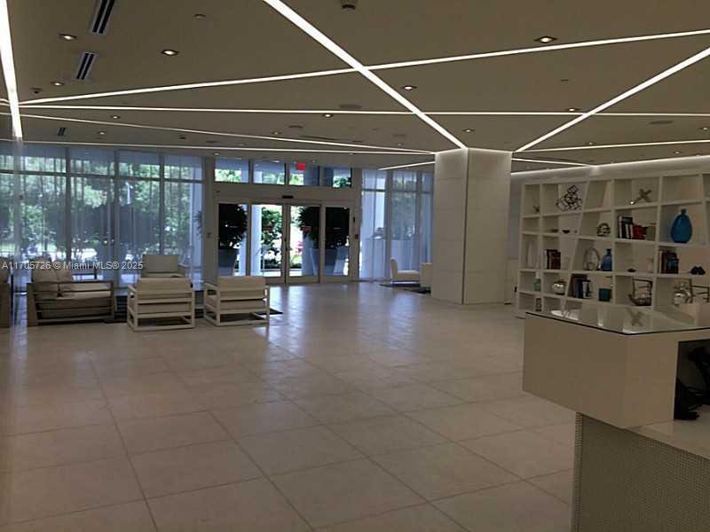 4250 Biscayne Boulevard, Unit 1104 Miami, FL 33137 - Photo 28 of 31 a view of a room with gym equipment