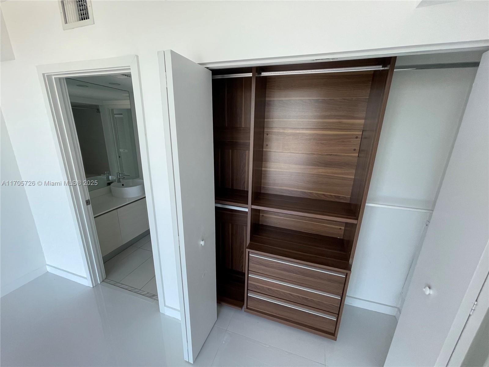 4250 Biscayne Boulevard, Unit 1104 Miami, FL 33137 - Photo 7 of 31 a view of walk in closet