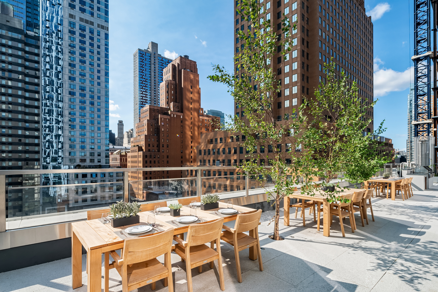 1 City Point, Unit PHE Brooklyn, NY 11201 - Photo 24 of 27 a view of an outside dining space with a table and chairs