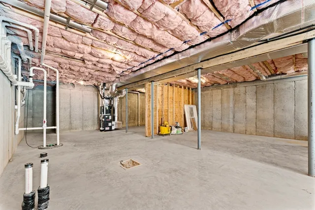 a view of a patio with table and chairs
