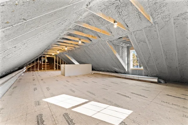 a view of a swimming pool with an outdoor space and seating area