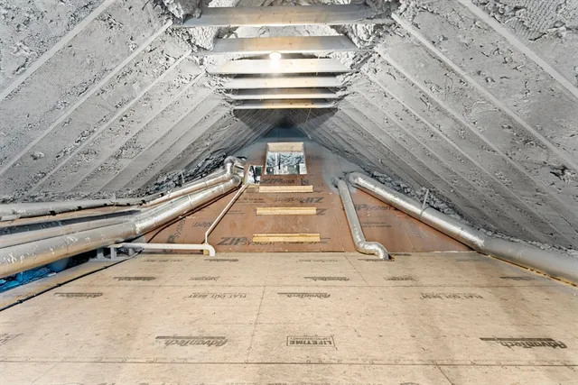 a view of a swimming pool with a yard