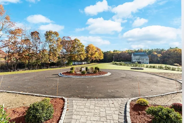 a view of a balcony with wooden fence