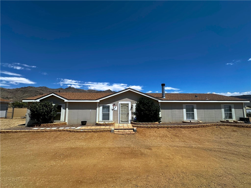 3746 Bouse Road Golden Valley, AZ 86413 - Photo 1 of 53 View of ranch-style house