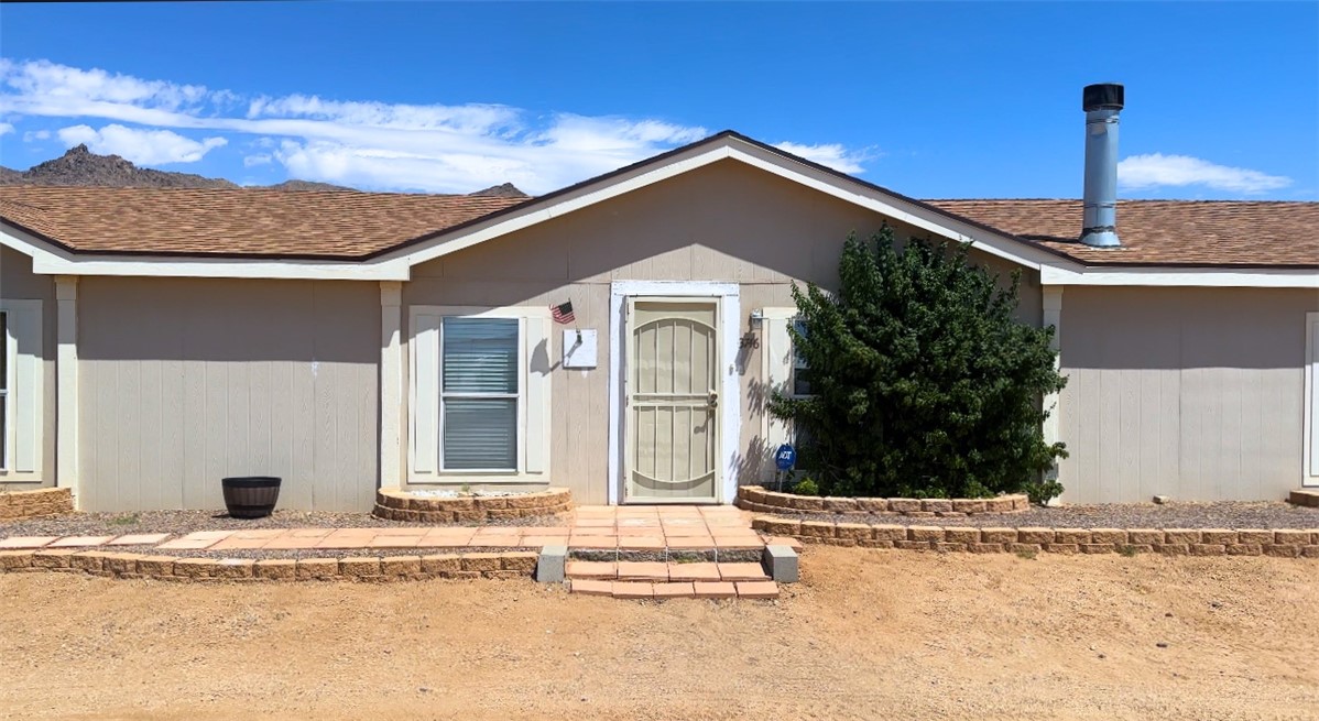 3746 Bouse Road Golden Valley, AZ 86413 - Photo 2 of 53 View of front facade with roof with shingles