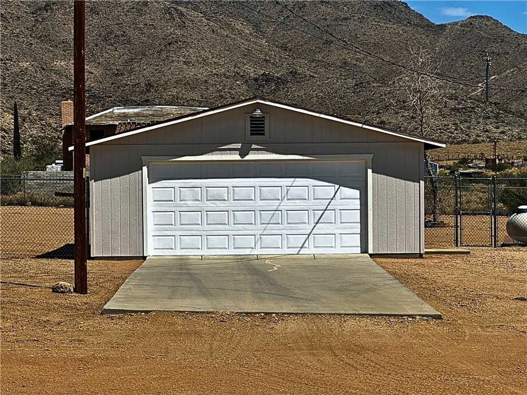 3746 Bouse Road Golden Valley, AZ 86413 - Photo 42 of 53 Detached garage with a mountain view
