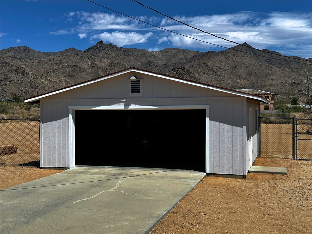 3746 Bouse Road Golden Valley, AZ 86413 - Photo 43 of 53 Detached garage with a mountain view