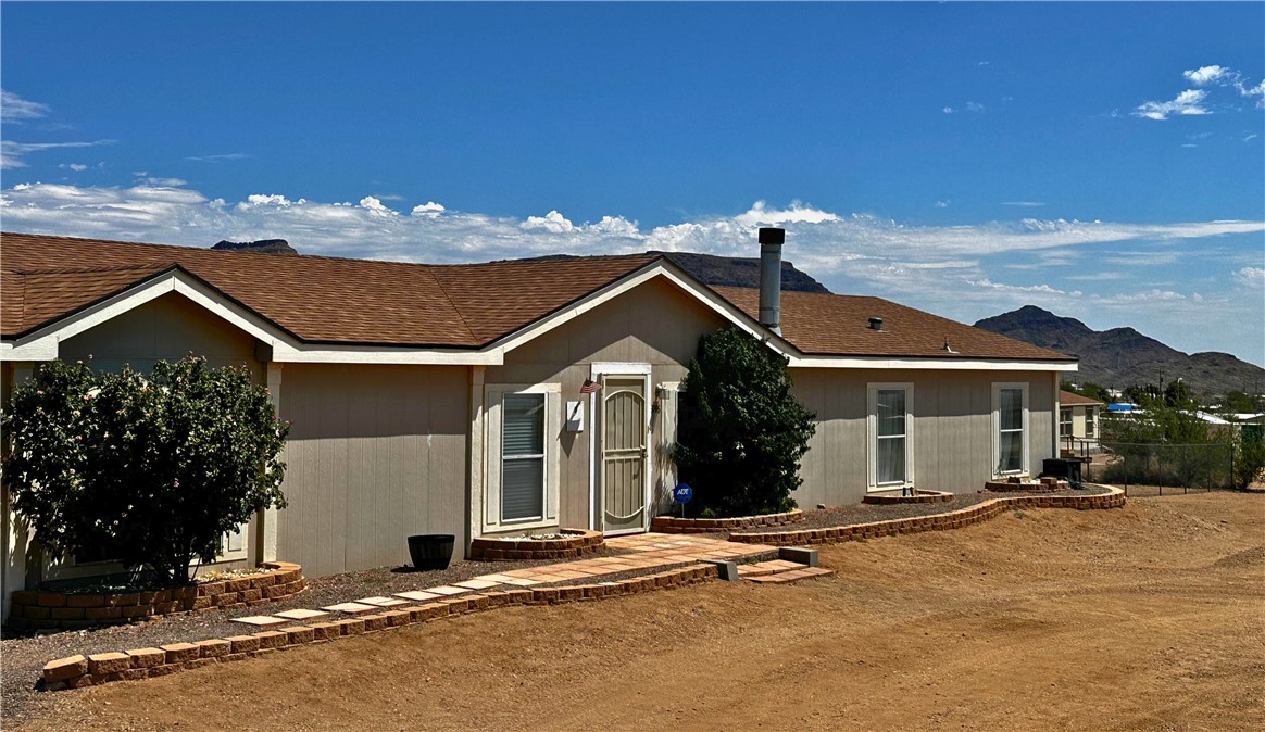 3746 Bouse Road Golden Valley, AZ 86413 - Photo 44 of 53 Back of property featuring a mountain view