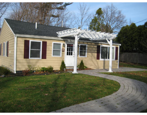 8 Hillcrest Road Scituate, MA 02066 - Photo 1 of 1 a front view of a house with a yard