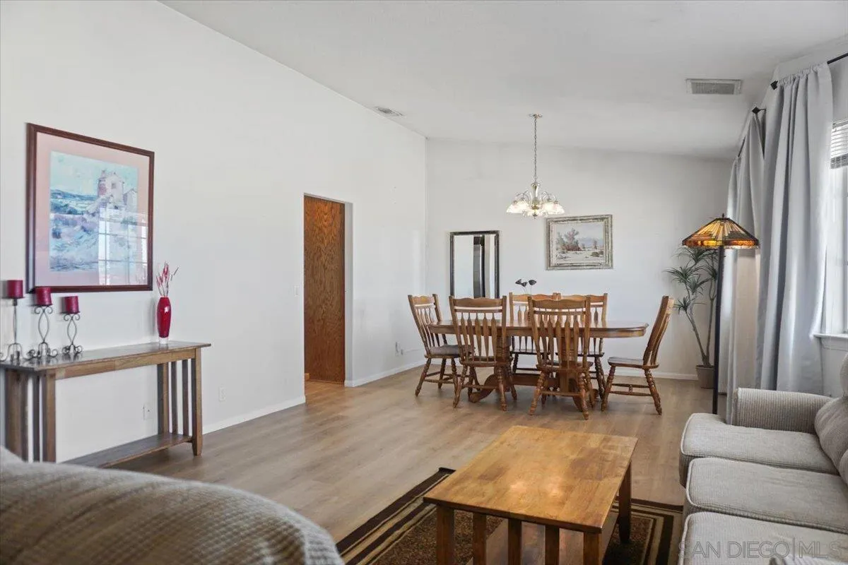 28525 Windy Pass Barstow, CA 92311 - Photo 13 of 40 a view of a livingroom with furniture and a dining table