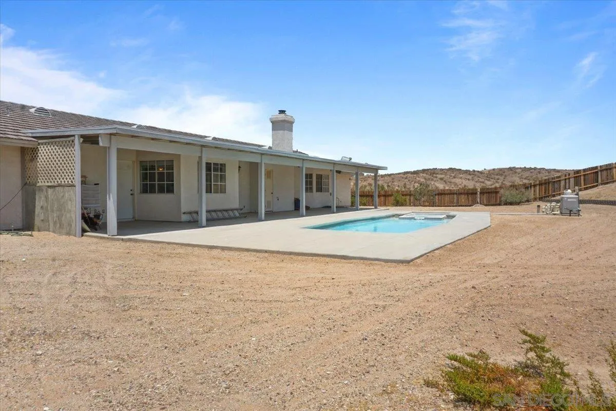 28525 Windy Pass Barstow, CA 92311 - Photo 38 of 40 a view of a house with a yard