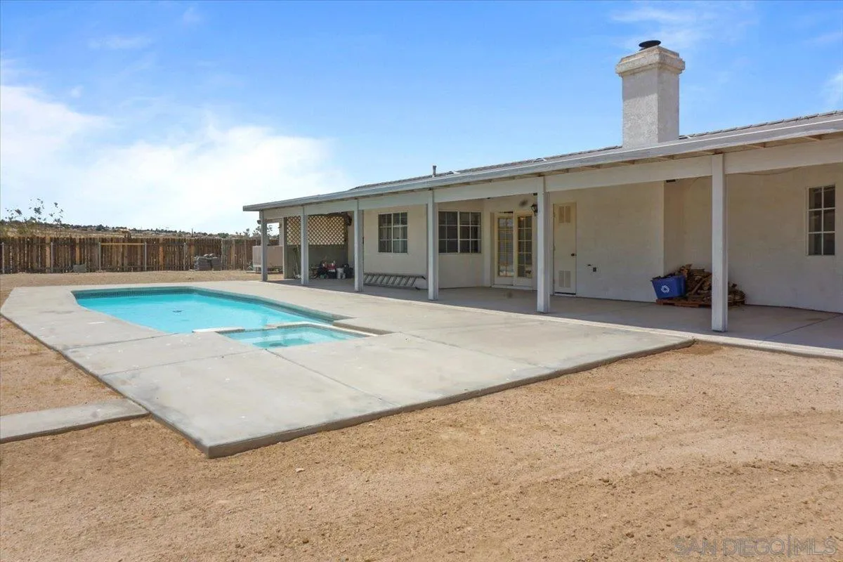28525 Windy Pass Barstow, CA 92311 - Photo 39 of 40 a view of a house with a backyard and porch