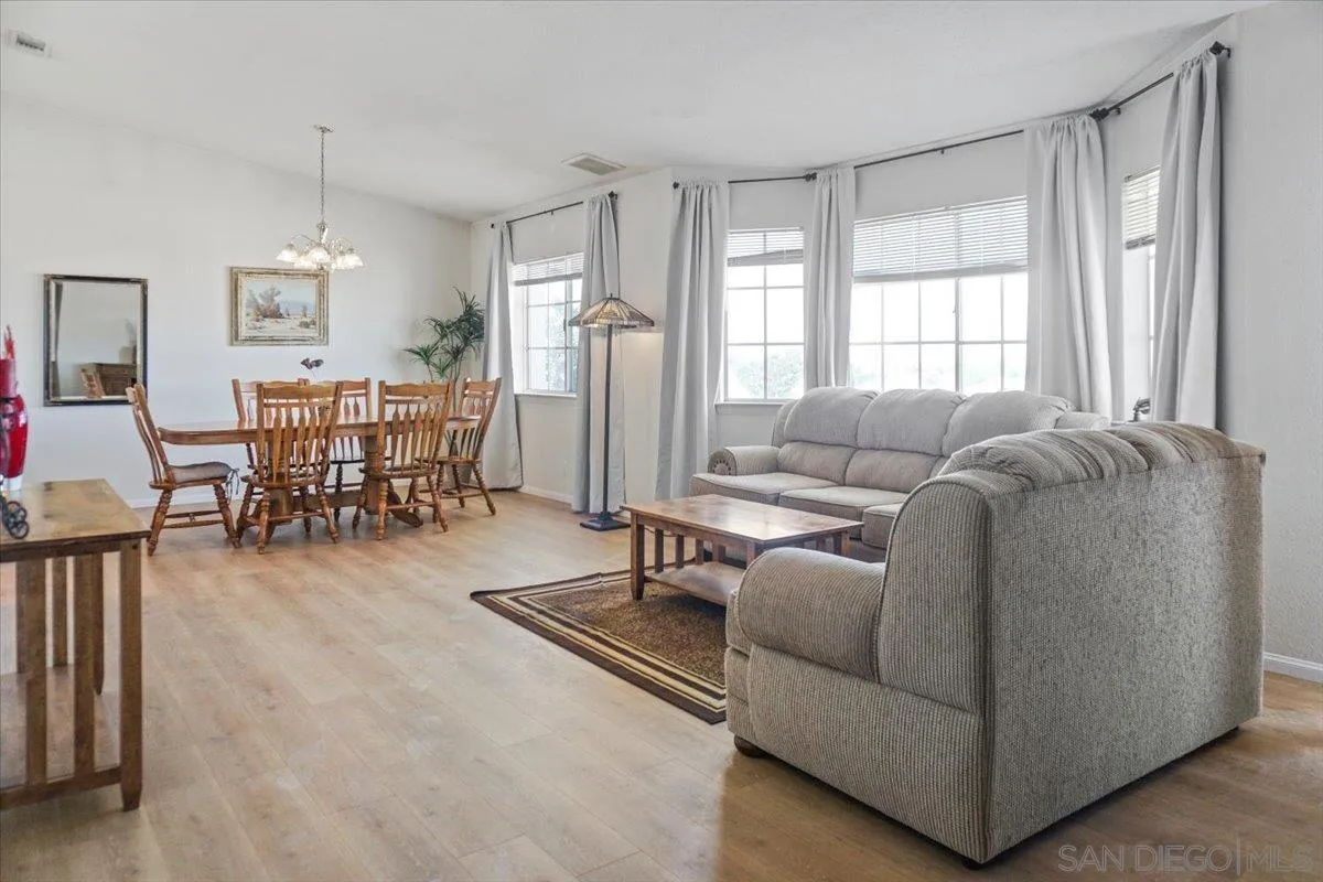 28525 Windy Pass Barstow, CA 92311 - Photo 10 of 40 a living room with furniture and a dining table