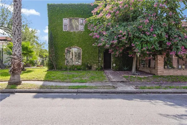a view of a building with a street