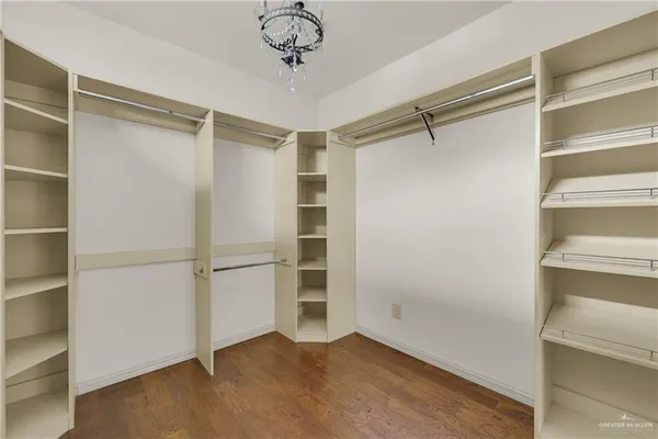 a view of an empty walk in closet
