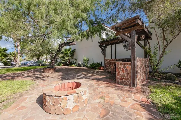 a view of a backyard of the house