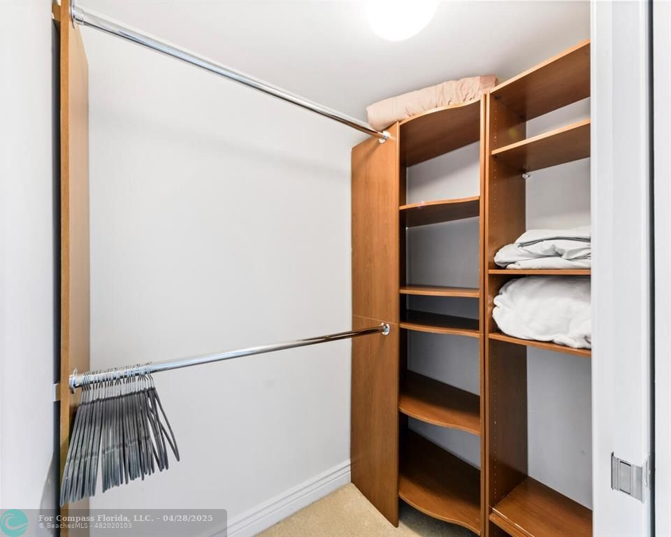 101 South Fort Lauderdale Beach Boulevard, Unit 1104 Fort Lauderdale, FL 33316 - Photo 22 of 41 a view of walk in closet with clothes and shoes