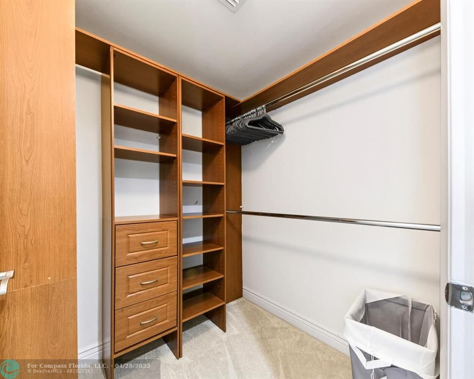 101 South Fort Lauderdale Beach Boulevard, Unit 1104 Fort Lauderdale, FL 33316 - Photo 24 of 41 a view of walk in closet with empty racks