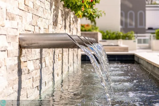 a view of pool with outdoor seating