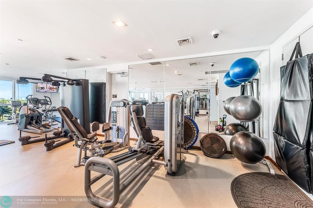 101 South Fort Lauderdale Beach Boulevard, Unit 1104 Fort Lauderdale, FL 33316 - Photo 39 of 41 a view of a room with gym equipment